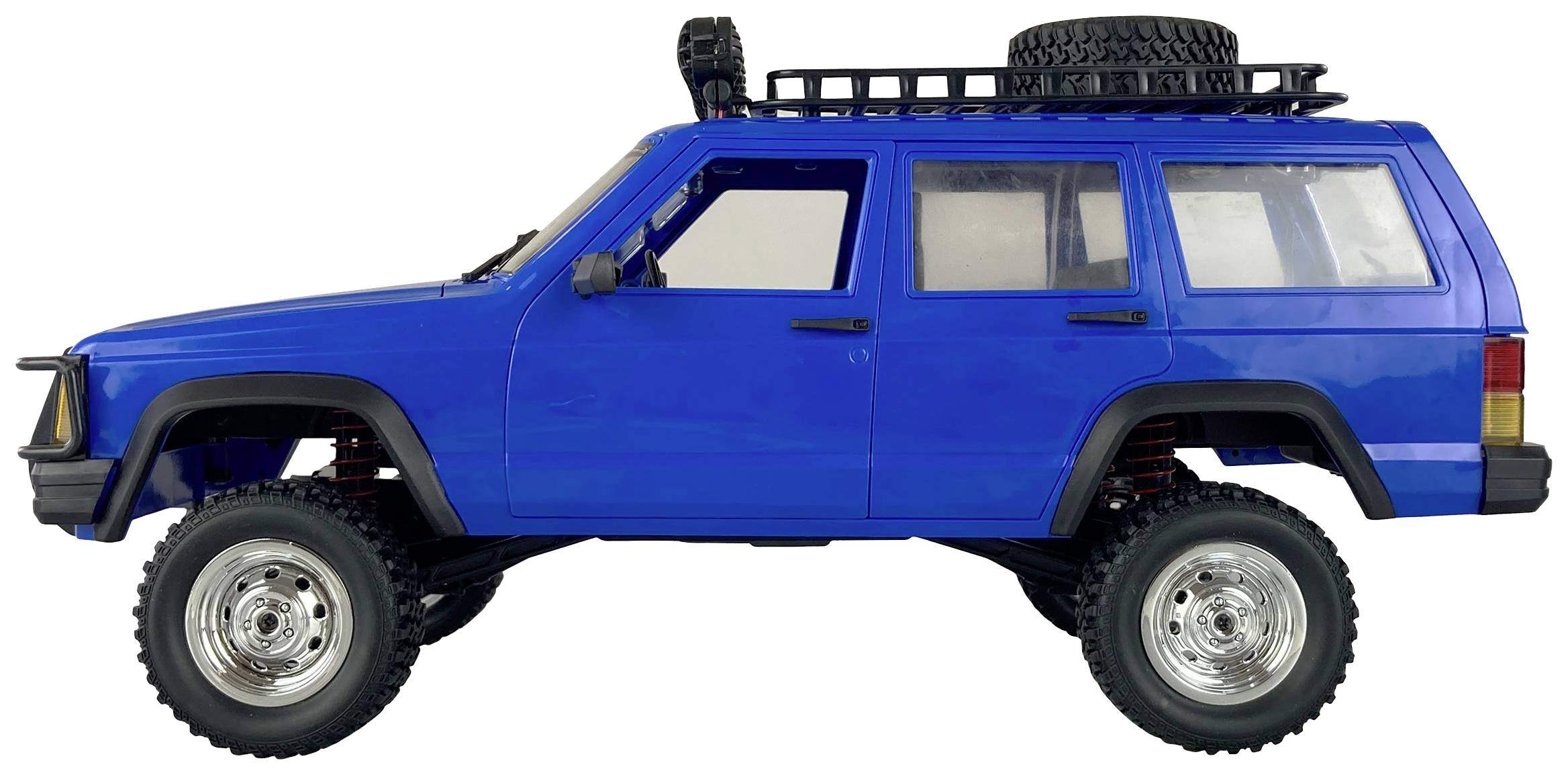 Véhicule tout-terrain bleu vu de profil, équipé d'un porte-bagages de toit et d'une roue de secours, parfaitement adapté aux randonnées tout-terrain.