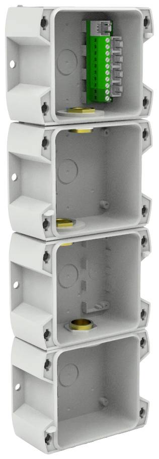 Quatre boîtes de connexion grises empilées, celle du dessus contenant une barrette de connexion verte avec plusieurs ports.