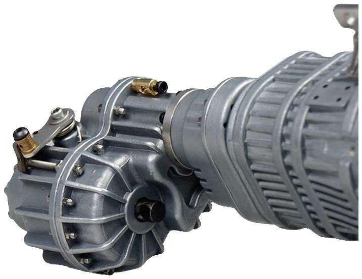 Gros plan d'un élément d'engrenage métallique avec des composants cylindriques et structurés, probablement utilisé dans des machines.