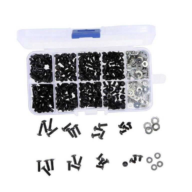 Une boîte en plastique avec différents compartiments, remplie de vis et d'écrous noirs. Quelques vis et écrous sont posés à côté.