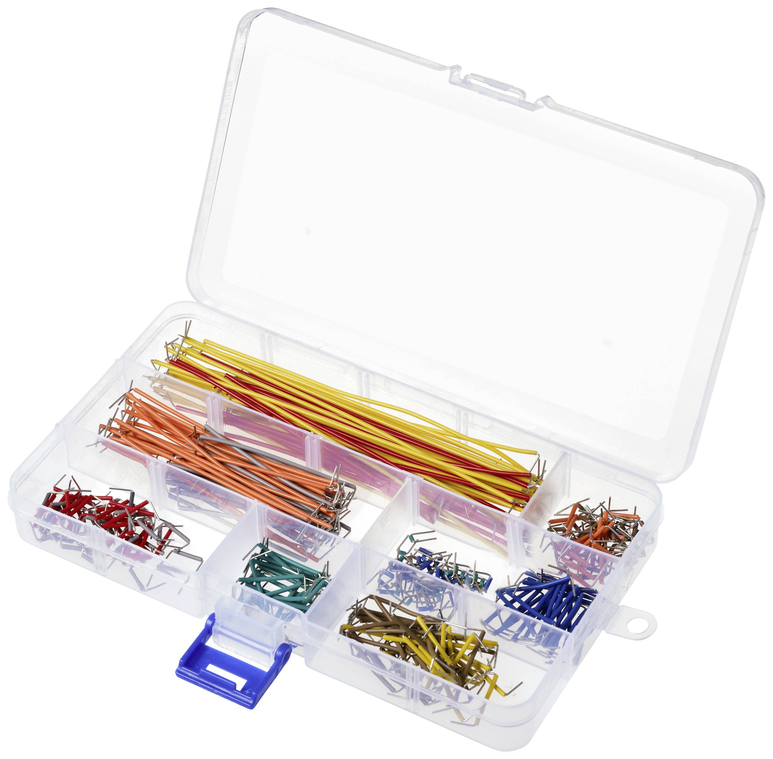Une boîte en plastique transparent avec plusieurs compartiments, contenant des ponts de fil colorés pour une utilisation sur des planches de montage.