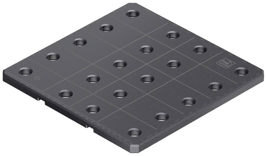 Un bloc métallique noir percé de plusieurs trous à intervalles réguliers. Probablement utilisé pour des applications industrielles ou techniques.