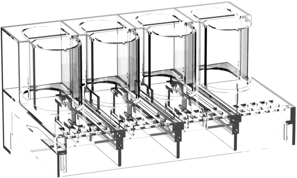 Support transparent avec quatre chambres cylindriques, probablement destiné à des fins de laboratoire ou de tests.
