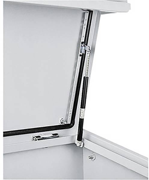 L'image montre le mécanisme d'ouverture d'un appareil blanc avec un couvercle. Un support à ressort noir et argenté maintient le couvercle ouvert.