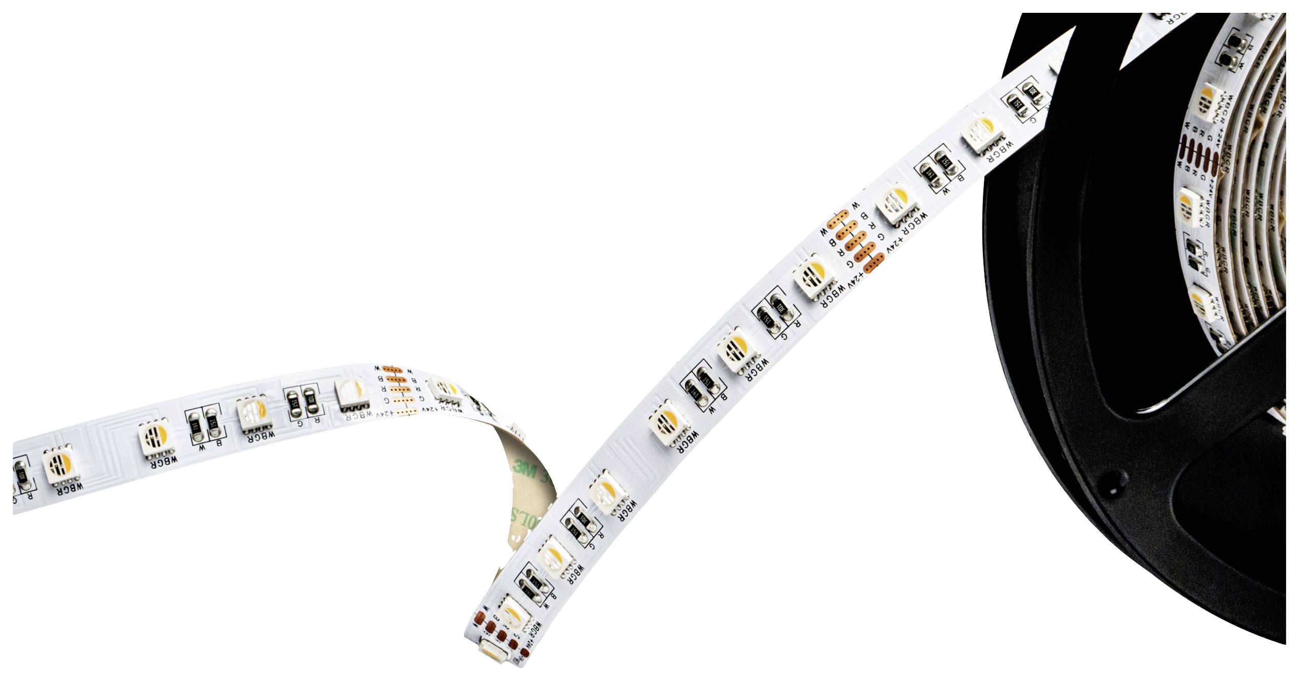 Une bande LED, partiellement enroulée, montre de petites LED rectangulaires et des composants électroniques sur une bande flexible.