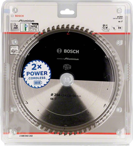Lame de scie circulaire dans un emballage en plastique. Adaptée à l'aluminium, sans fil, portant l'inscription '2x POWER CORDLESS'.