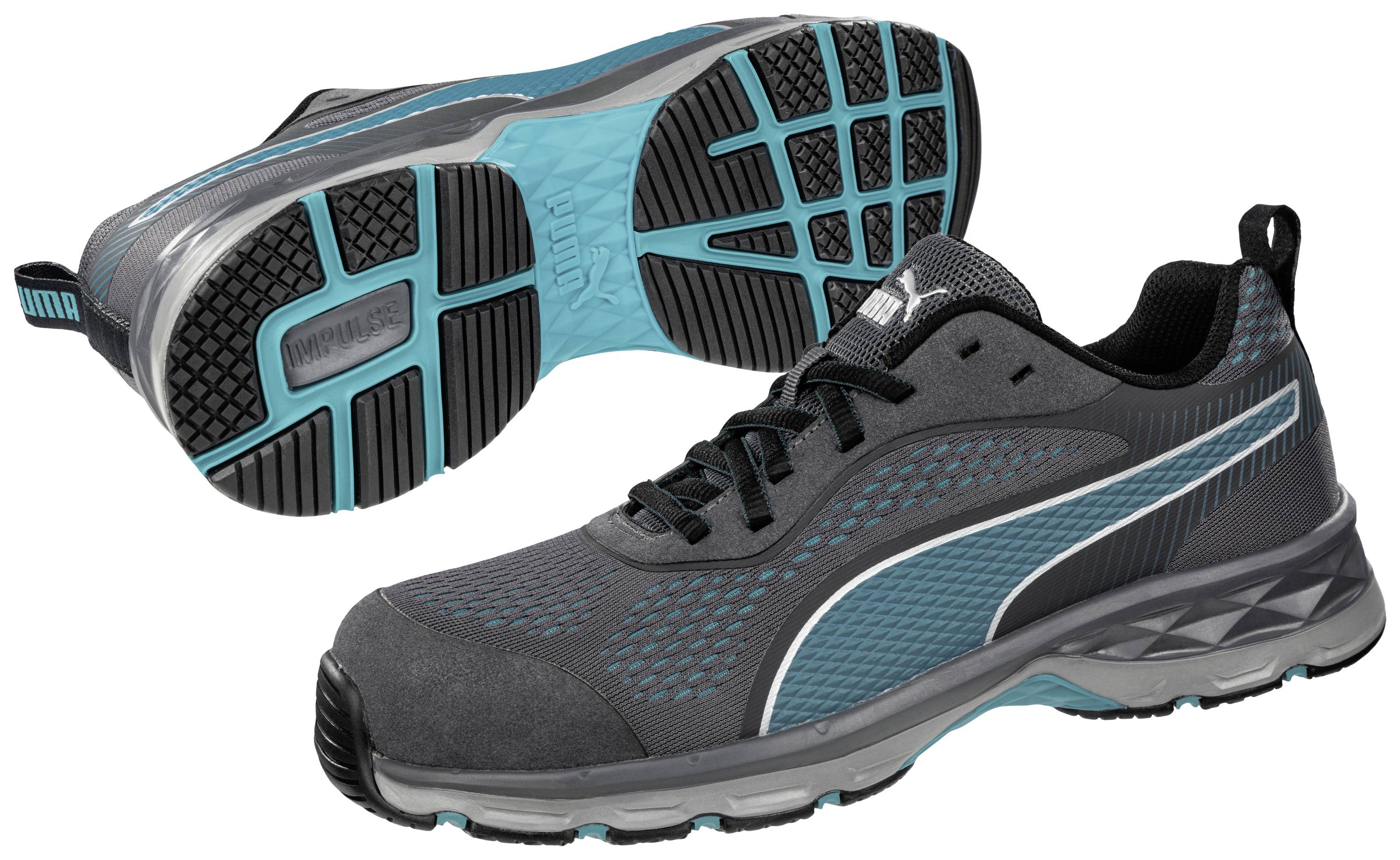 Une paire de chaussures de sport grises avec des accents turquoise et une semelle marquée. Idéales pour les activités sportives et le quotidien.