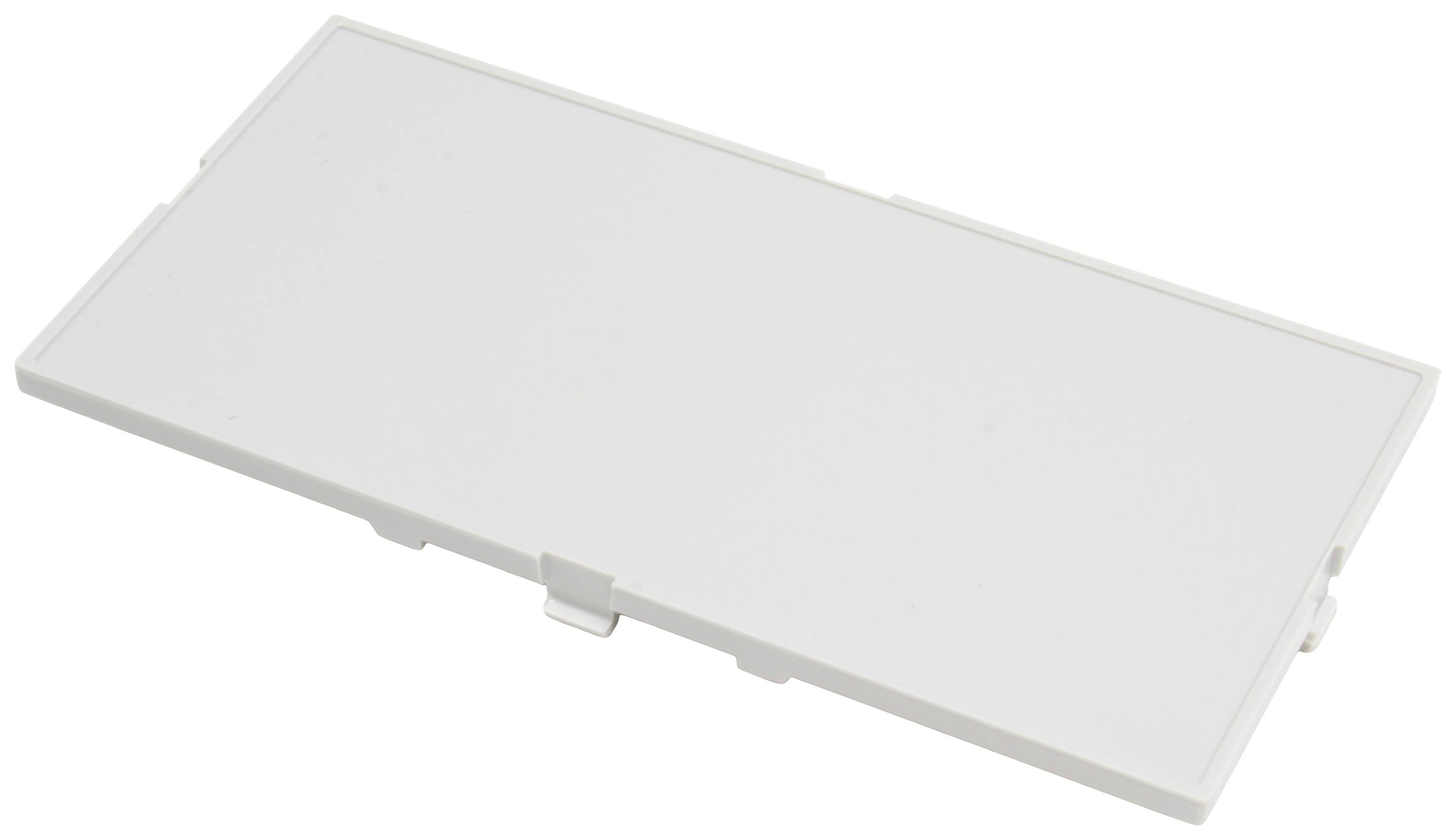 Couvercle rectangulaire blanc en plastique.