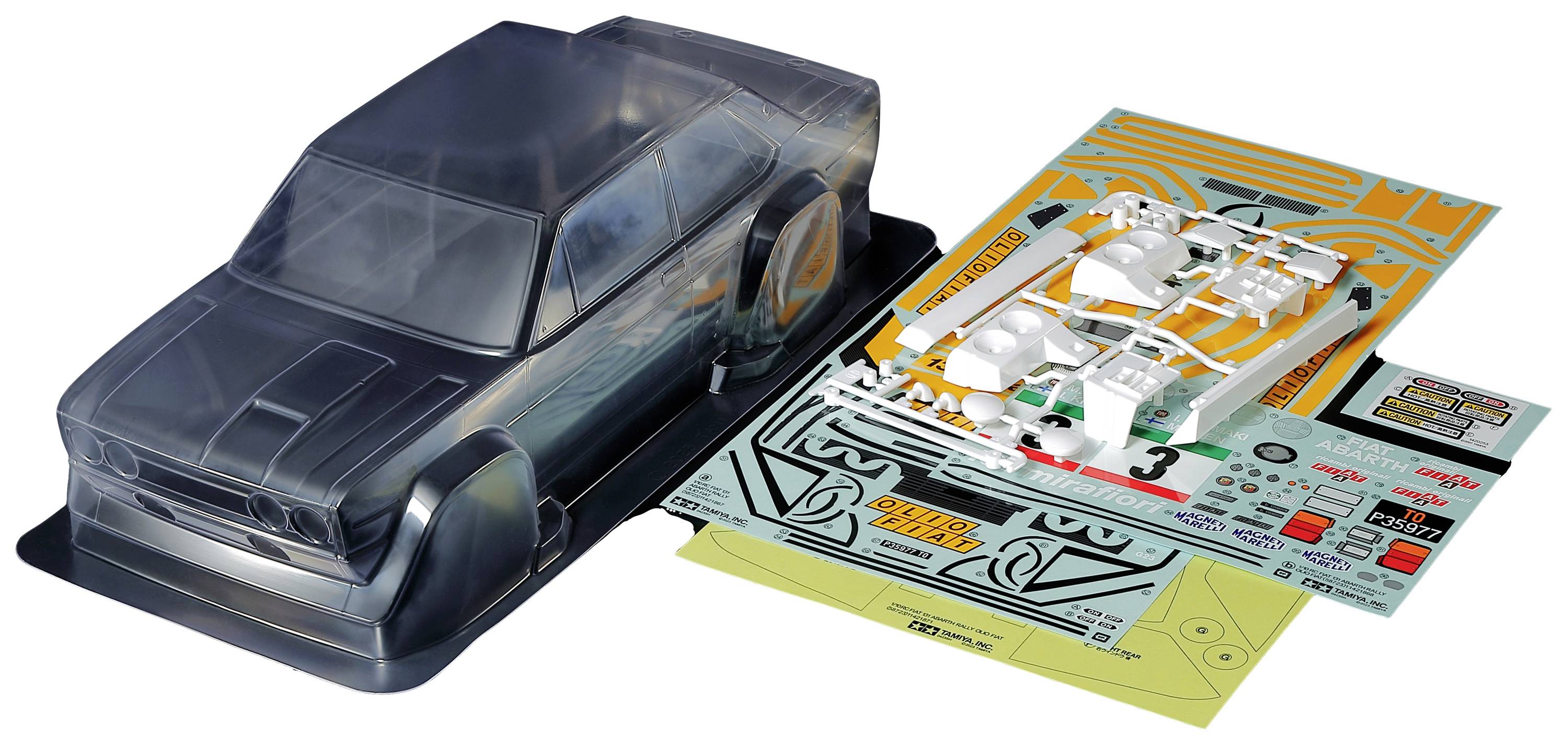 Modèle en plastique d'une voiture avec un châssis transparent, à côté duquel se trouve une feuille avec des autocollants et des pièces pour personnalisation.