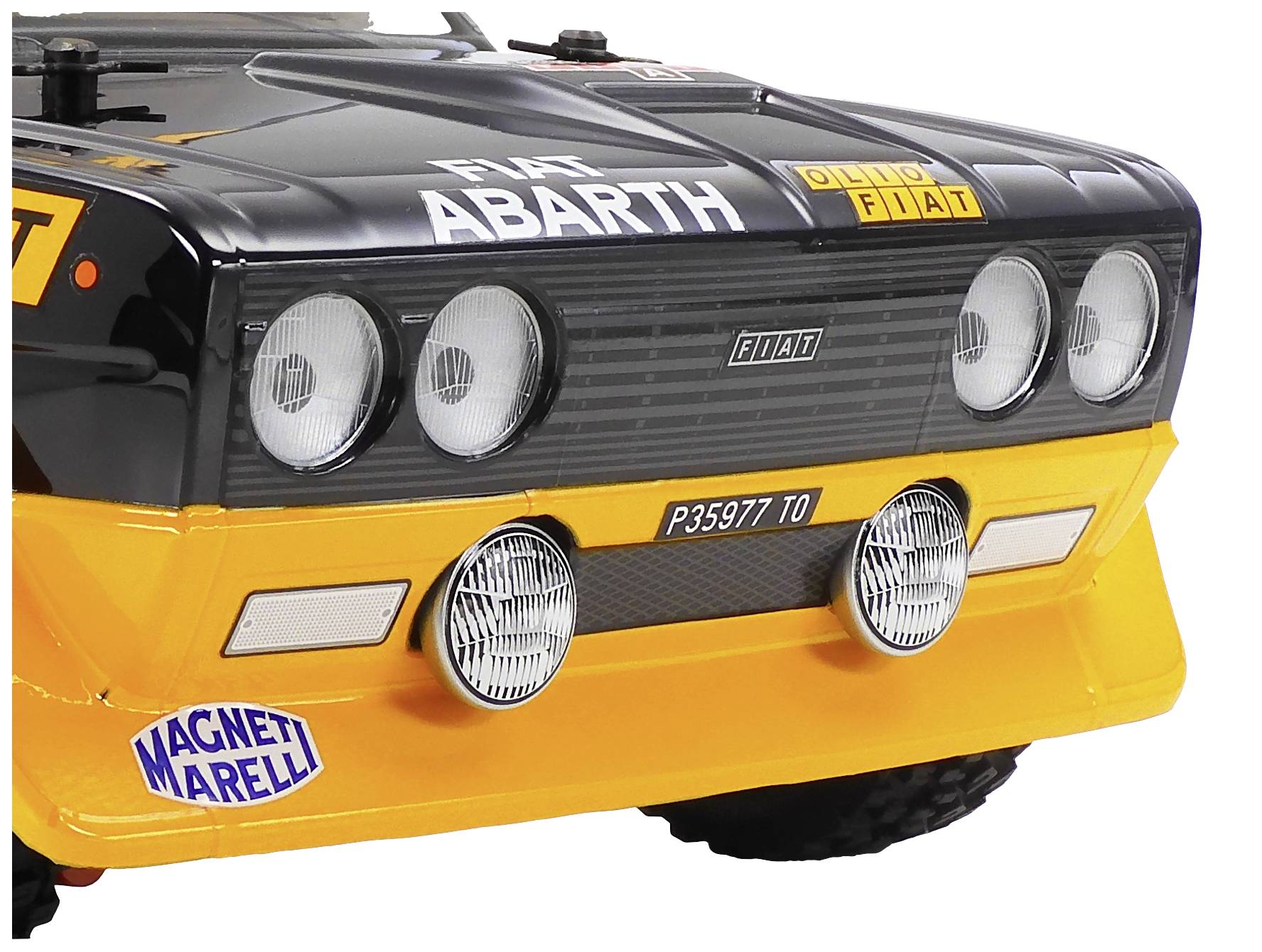 Véhicule de rallye avec un design jaune et noir, des phares arrondis et des autocollants, incluant 'Fiat Abarth' et 'Magneti Marelli'.
