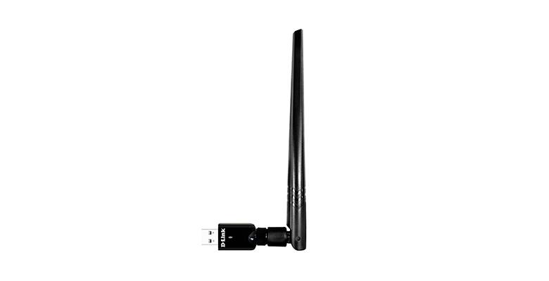 Un adaptateur USB Wi-Fi noir avec une grande antenne est dressé verticalement. Il sert à établir une connexion réseau sans fil pour les ordinateurs.