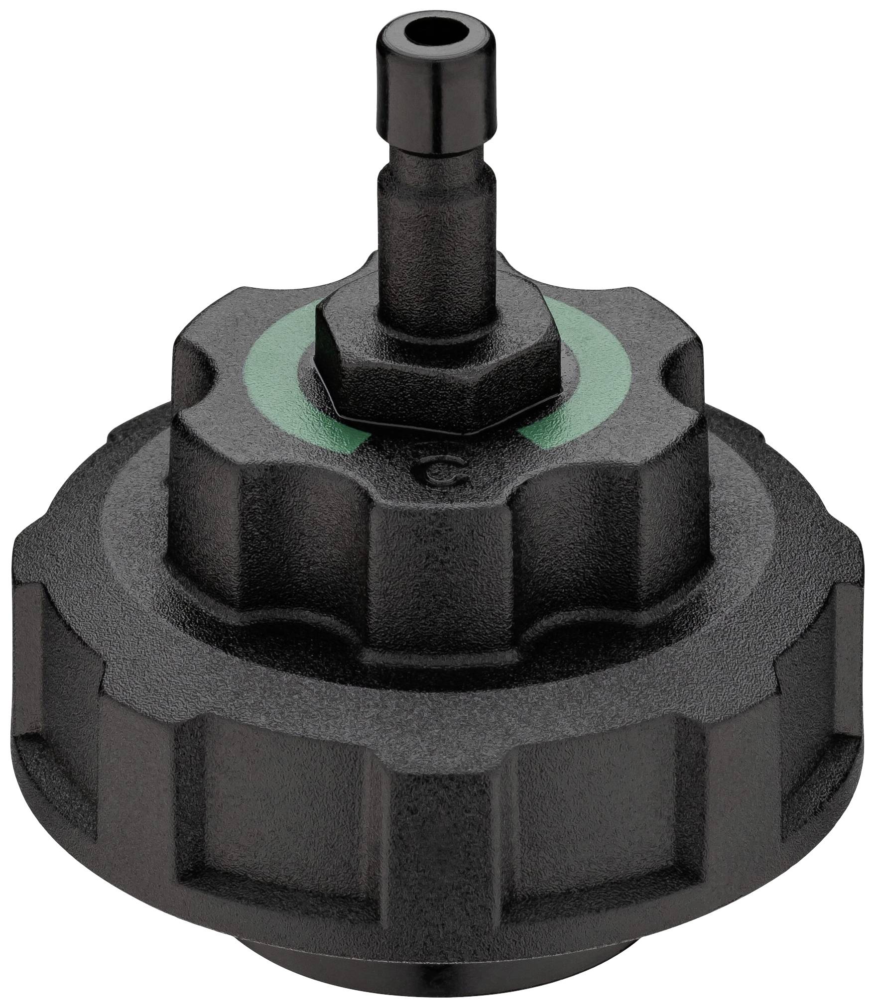 Un adaptateur noir strié avec un anneau vert sur le dessus, probablement un composant d'un dispositif technique ou mécanique.