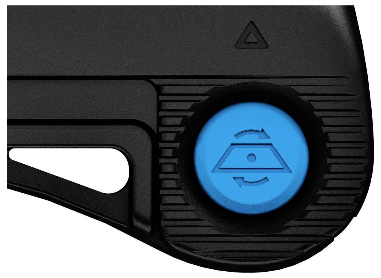 Objet noir avec un bouton bleu affichant un symbole d'œil. Le bouton est entouré de lignes et comporte une marque triangulaire au-dessus.