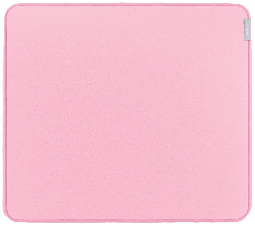 Un simple carré de tissu rose pâle aux coins arrondis, avec une petite étiquette dans le coin supérieur droit.