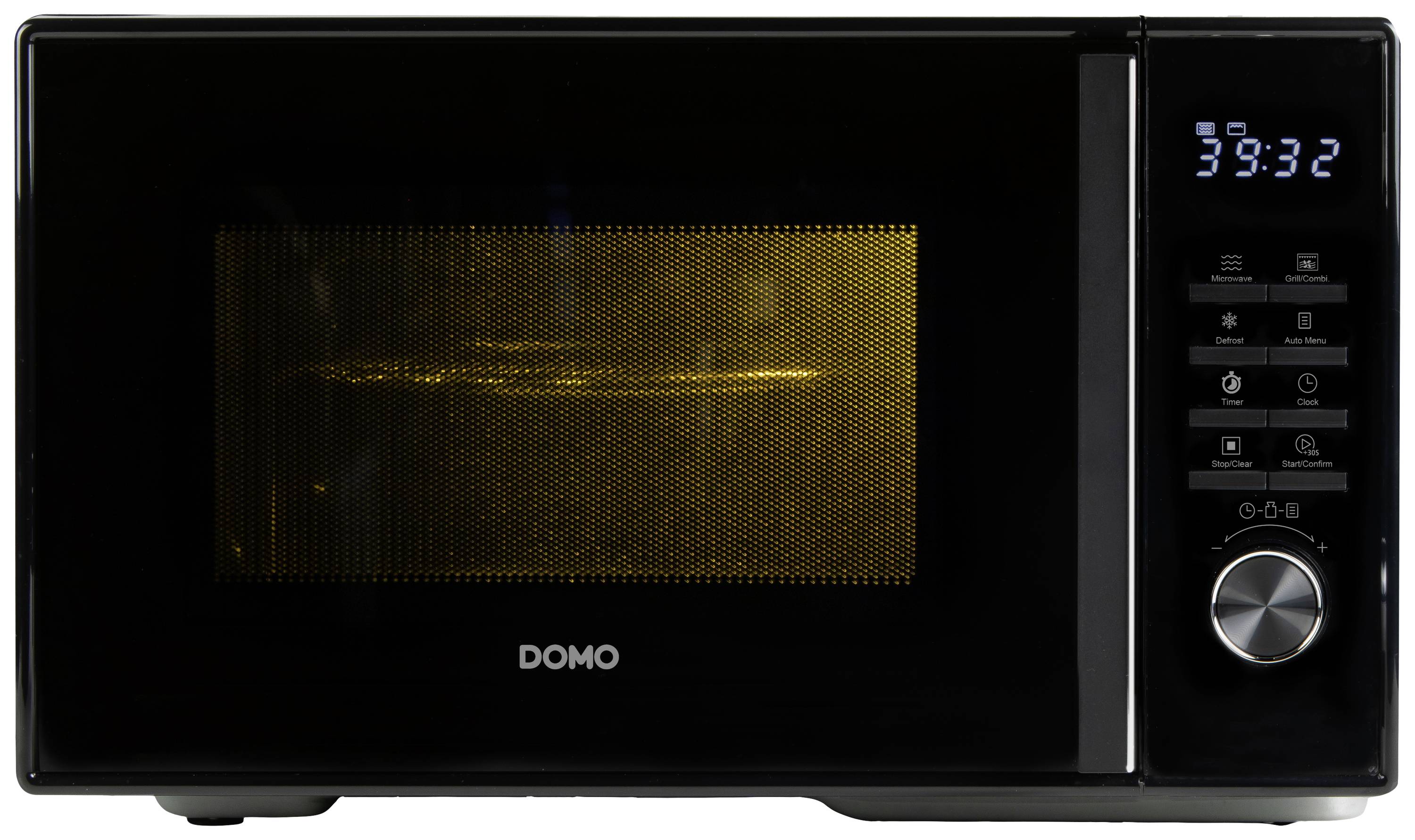 Four micro-ondes noir avec affichage numérique indiquant 39:32. À gauche, l'intérieur illuminé est visible à travers une grille.