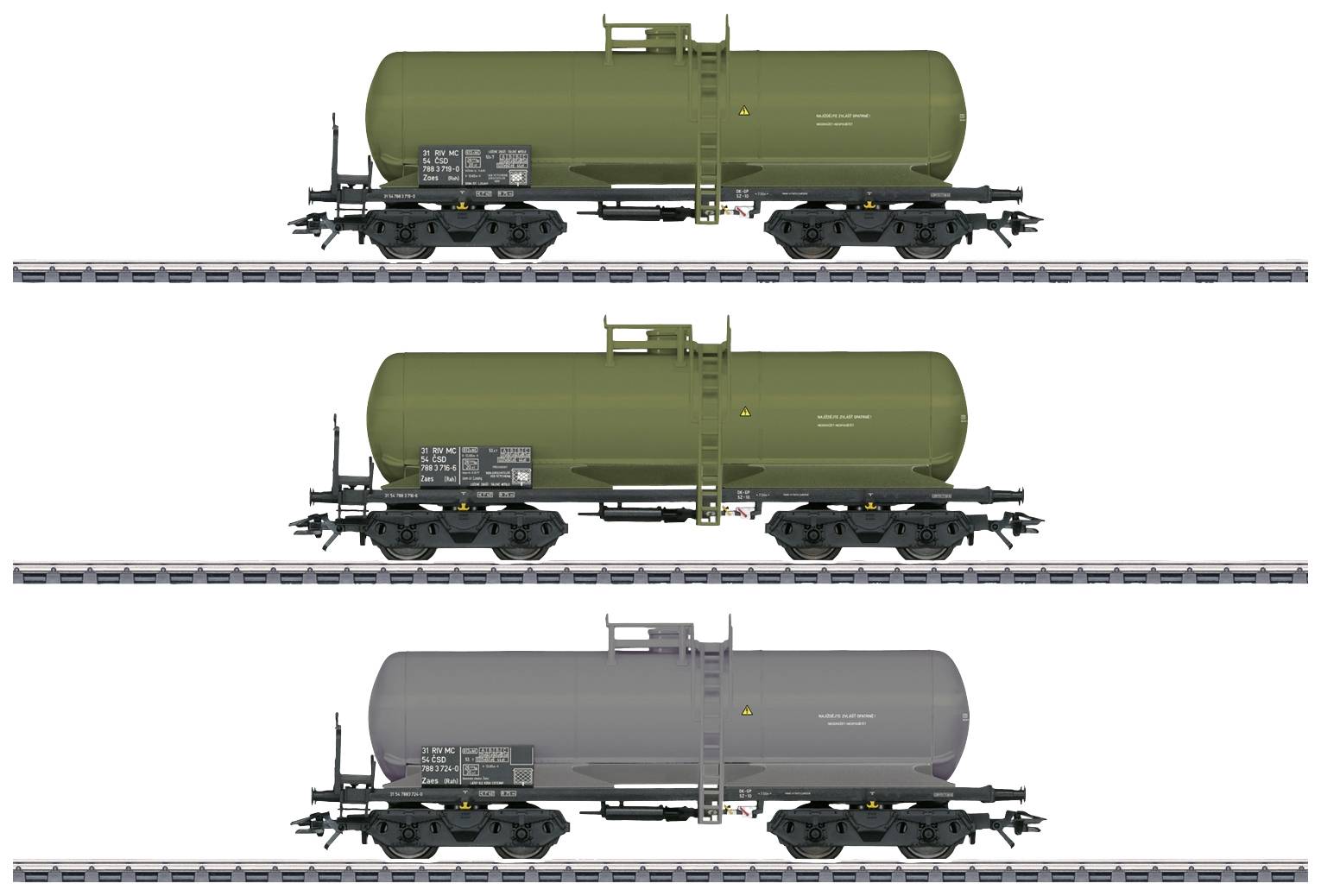 'Trois wagons de marchandises alignés sur des rails, chacun équipé d'un grand réservoir cylindrique pour liquides.'