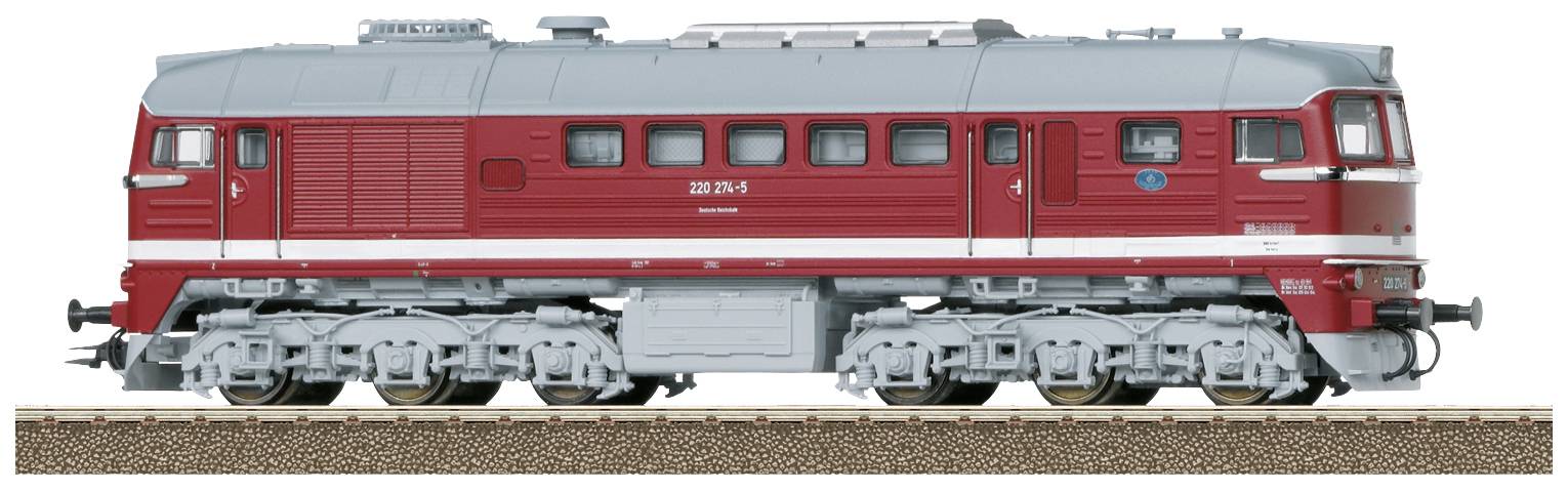 Modèle rouge d'une locomotive diesel-électrique avec des détails argentés et gris, stationnée sur une section de voie ferrée.