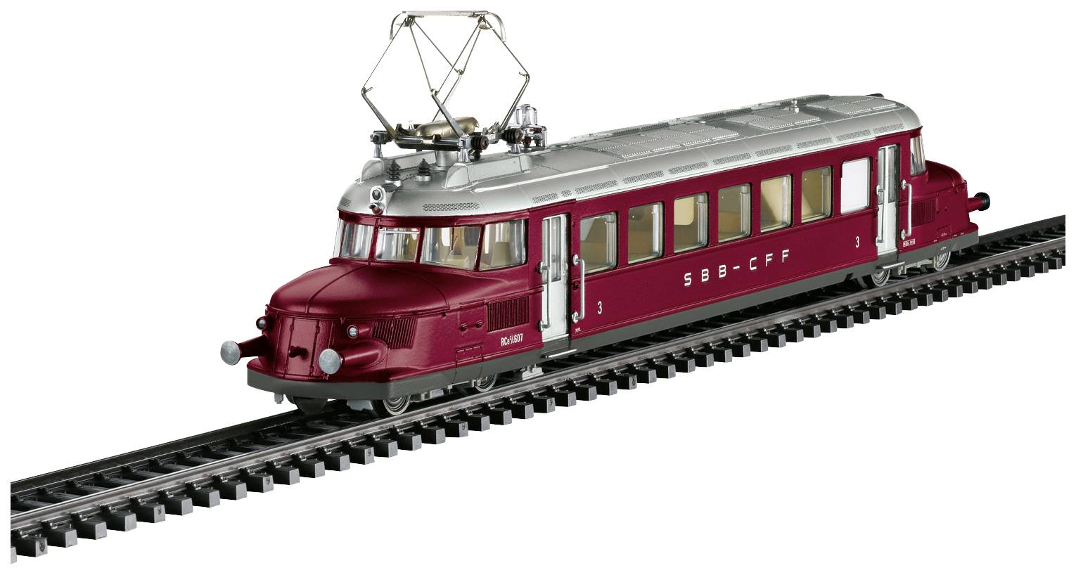 Un modèle rouge du zeppelin ferroviaire suisse sur une voie. Il est finement détaillé avec l'inscription « SBB-CFF ».