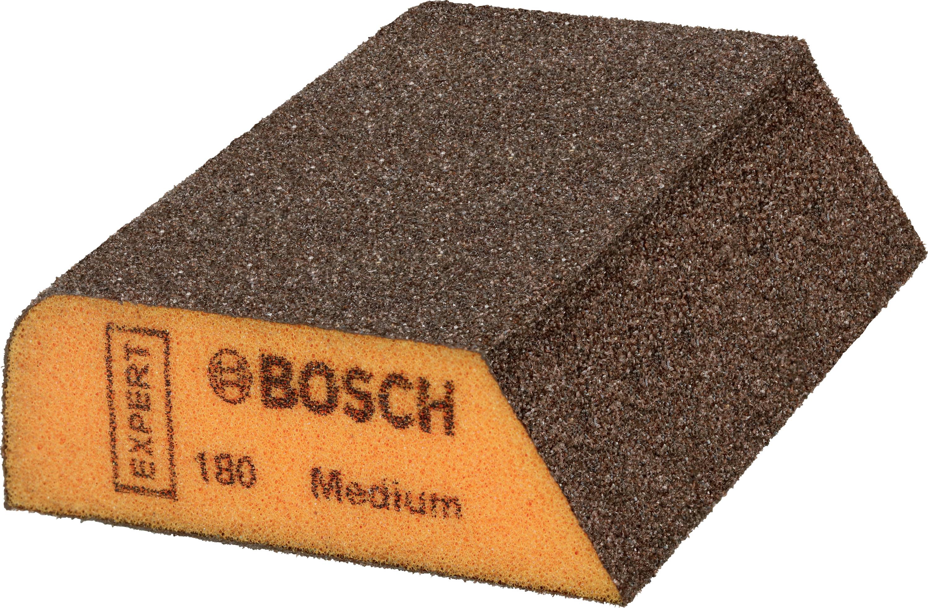 Éponge abrasive Bosch, identifiée par 'EXPERT Medium 180'. Forme trapézoïdale, face supérieure brune, face inférieure orange.
