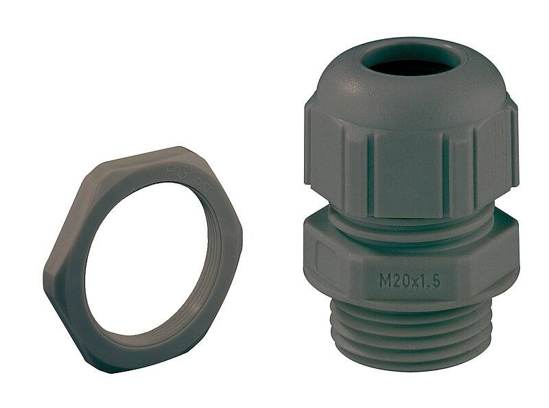 Presse-étoupe gris avec écrou, taille M20x1.5, pour le passage et la fixation sécurisés des câbles dans les installations électriques.
