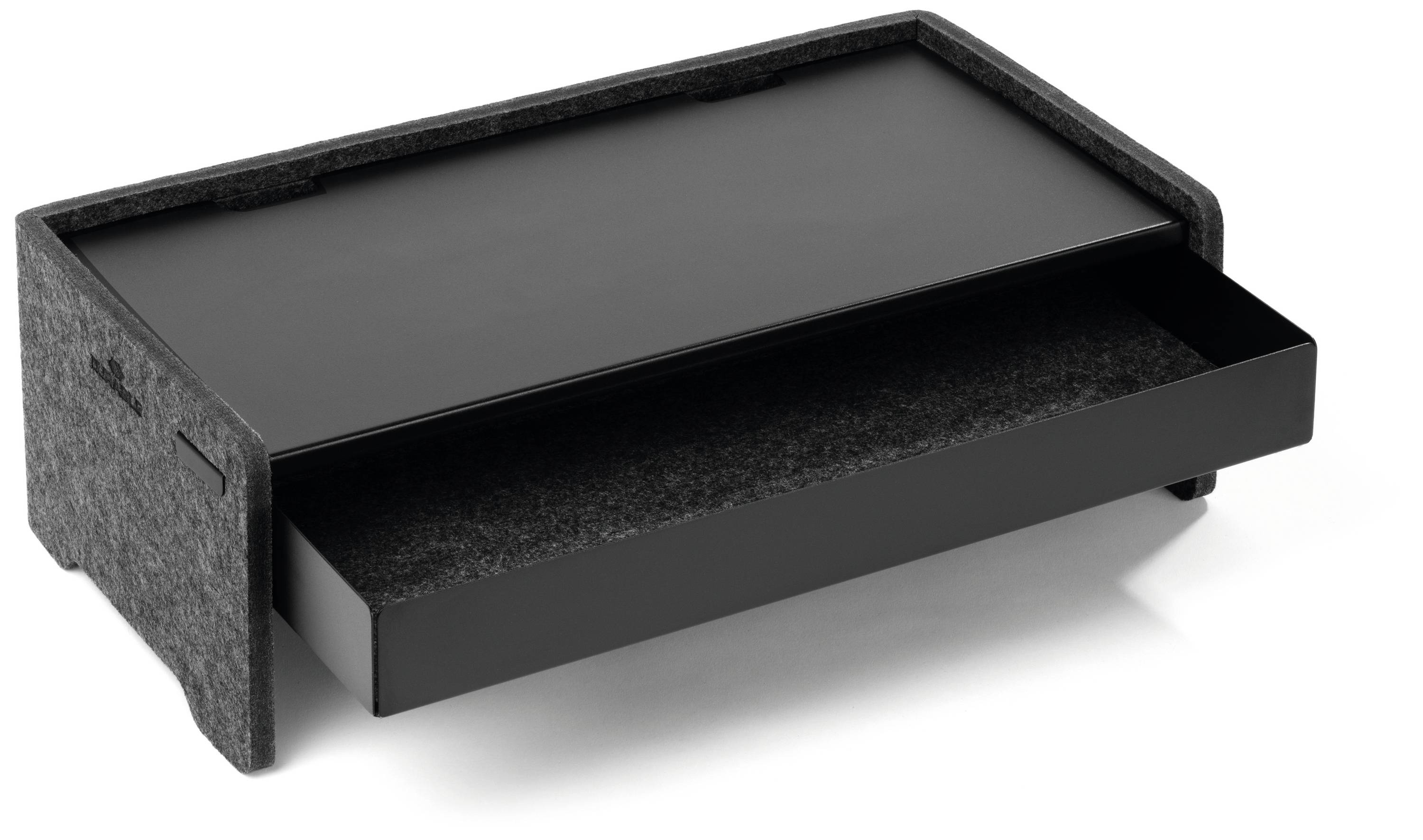 Un accessoire de bureau noir et rectangulaire, doté d'un tiroir coulissant destiné au rangement de petits articles de bureau.