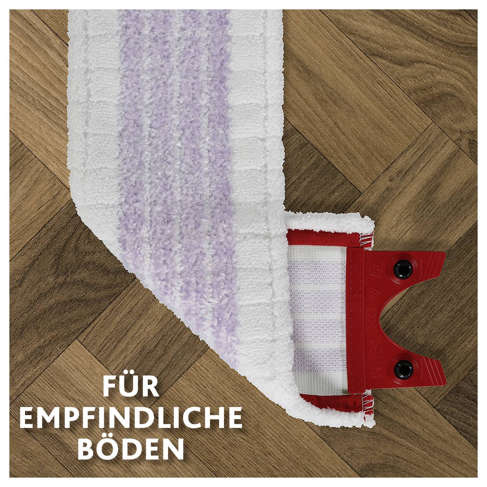 Tête de serpillière rouge sur un parquet en bois avec le texte allemand « FÜR EMPFINDLICHE BÖDEN » indiquant qu'elle est destinée aux sols sensibles.