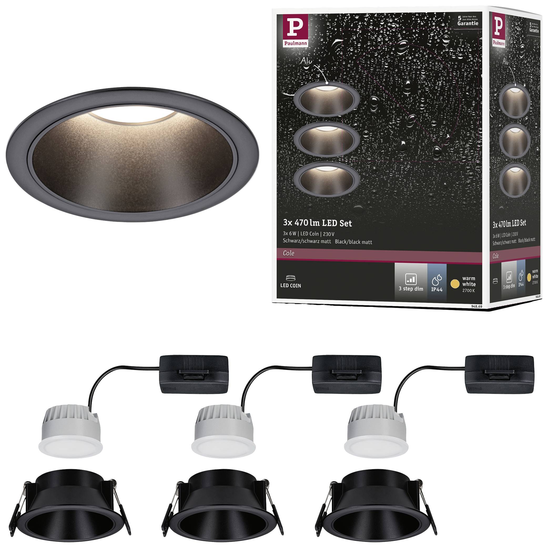 Trois spots encastrables LED ronds en noir, vendus en lot. Idéaux pour le jardin ou les zones humides. L'emballage indique la résistance à la pluie.