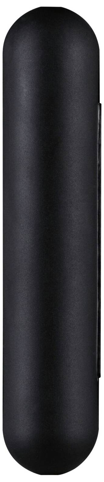 Un objet noir, cylindrique avec des extrémités arrondies, se tient verticalement. La texture de surface est lisse.