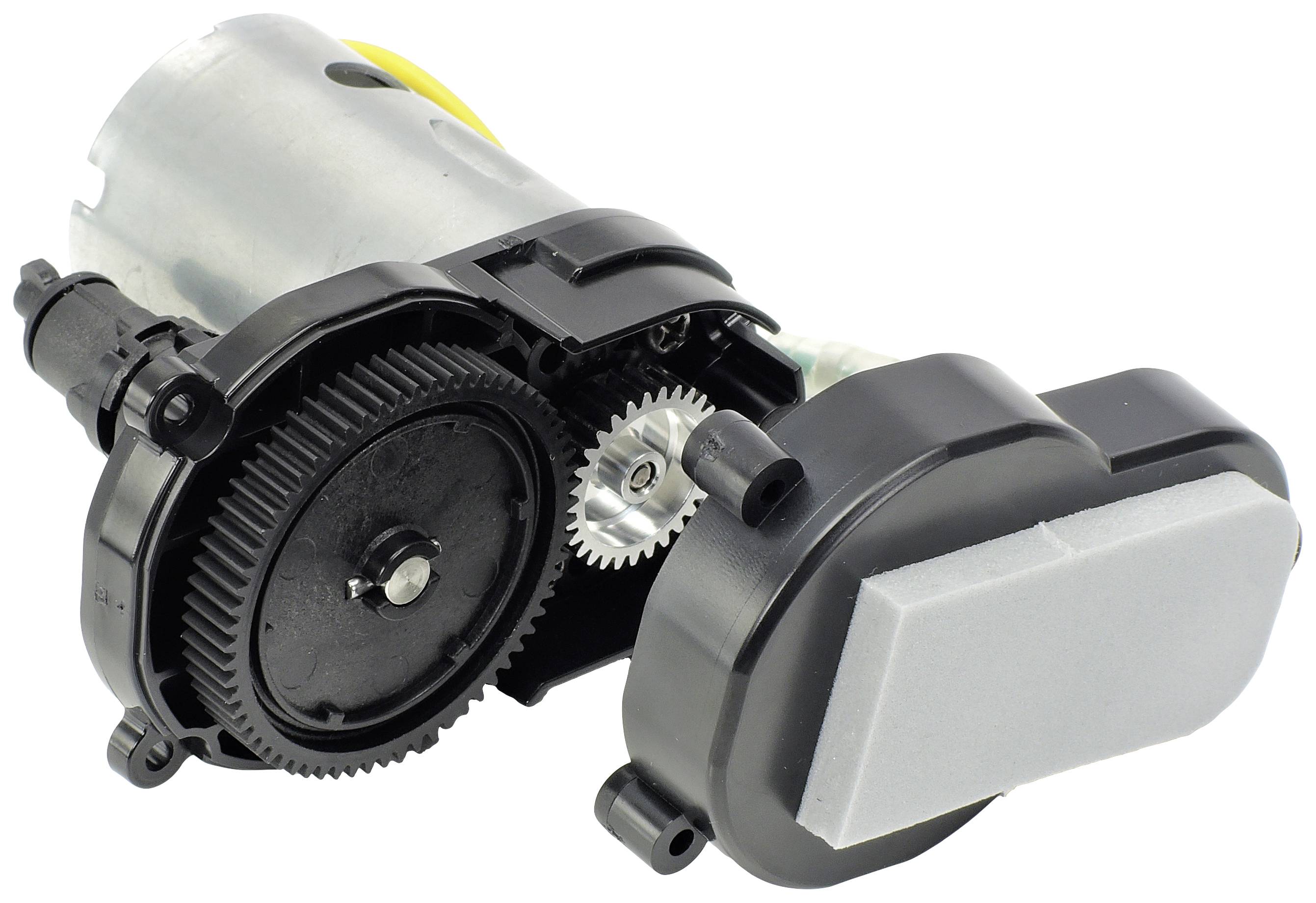 Un engrenage noir avec un moteur, partiellement caché par un couvercle en plastique, représenté individuellement sur un fond blanc.