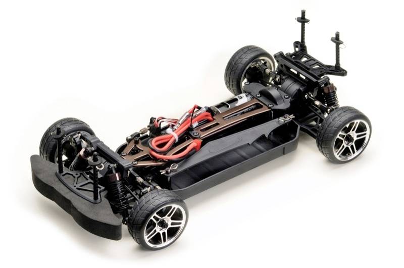 Voiture télécommandée sans carrosserie, montrant le moteur, les roues et le châssis. Adapté aux passionnés de modélisme.