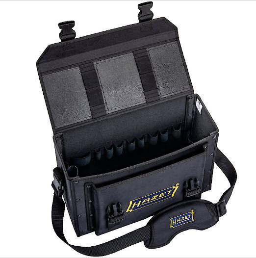 Sac à outils noir ouvert avec plusieurs compartiments et logo jaune 'Hazet'. Sangle de transport visible.