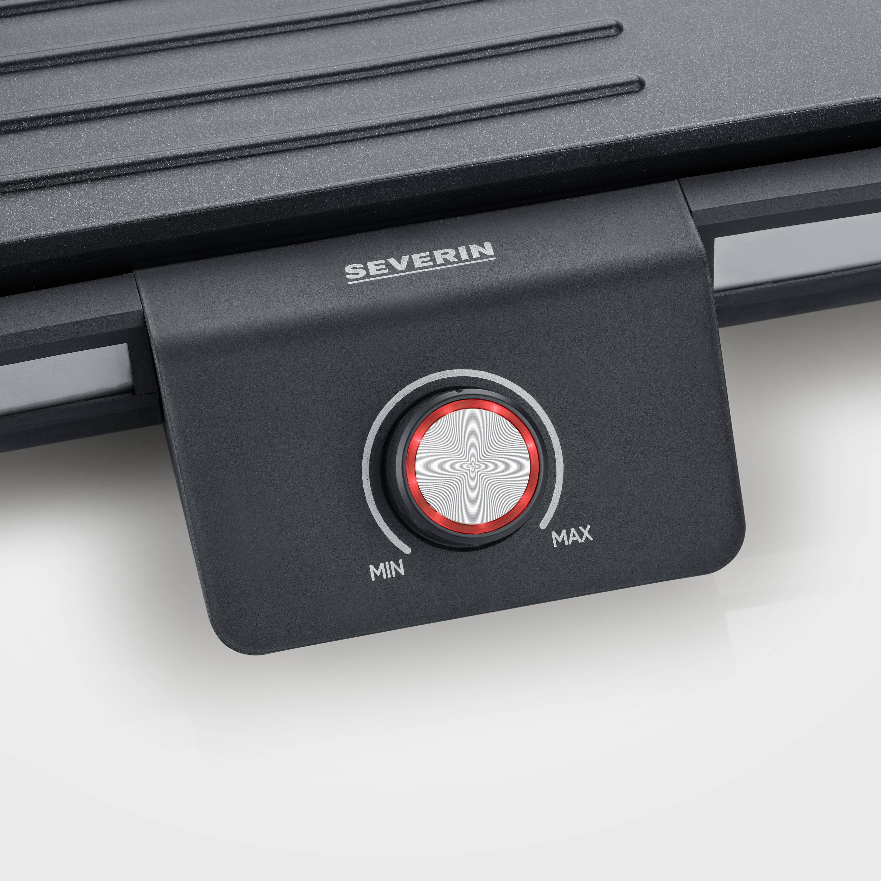 Grill électrique avec régulateur de température, réglable de Min à Max, présentant un design moderne avec une surface grise.