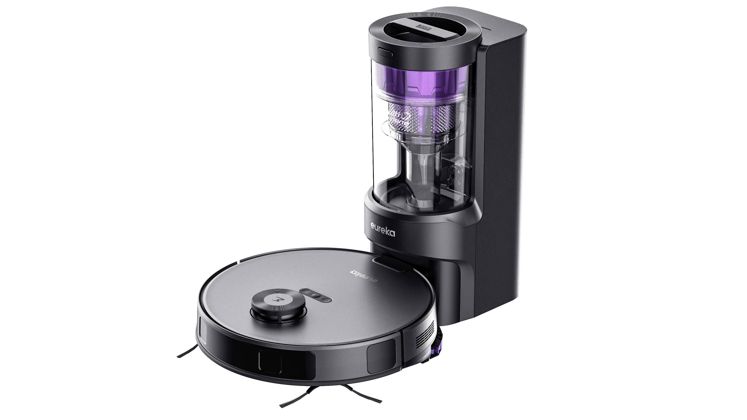 Un robot aspirateur noir et rond retourne à sa station de base. La base dispose d'un réservoir transparent avec des touches de couleur lilas.