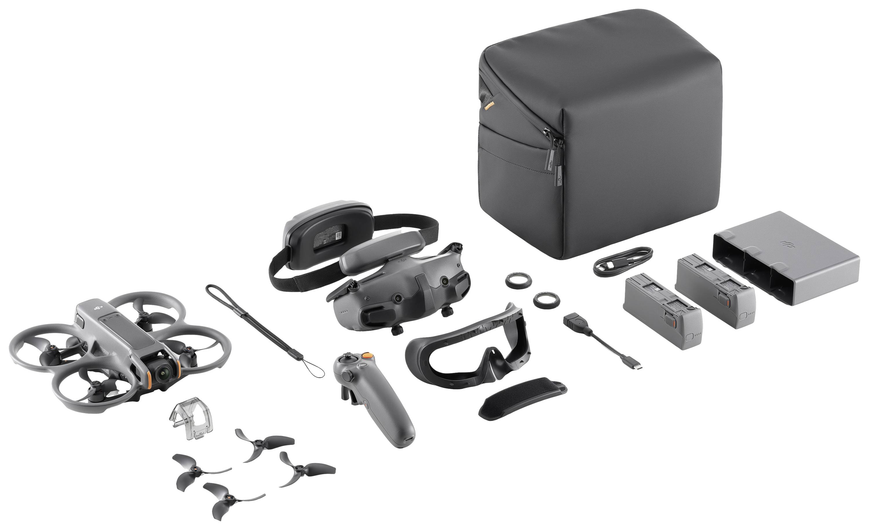 Drone avec accessoires : Drone, télécommande, lunettes de protection, batteries, chargeurs, sacde transport et hélices de rechange. Idéal pour les prises de vue aériennes.