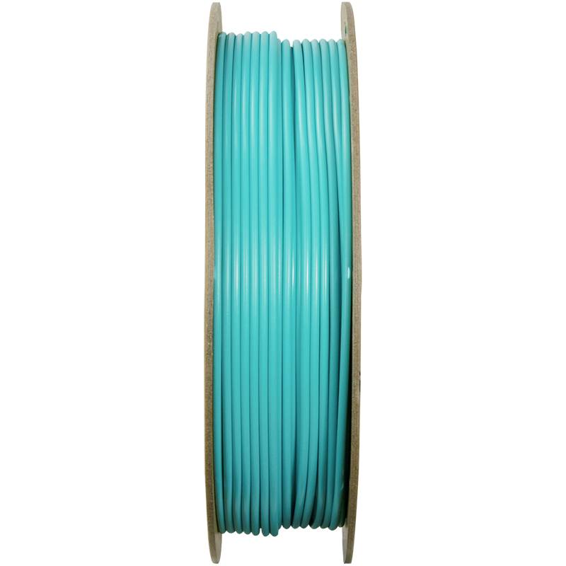 Un rouleau de fil en plastique turquoise, vu de côté. Le fil est enroulé uniformément sur la bobine.