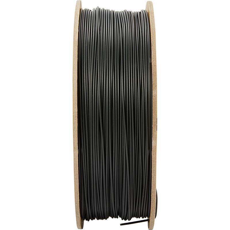 Un rouleau de câble noir, enroulé fermement sur une bobine, adapté aux installations électriques ou à d'autres applications.