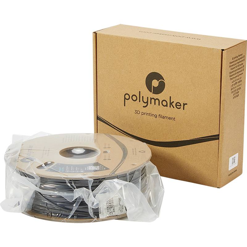 Une bobine de filament noir pour imprimante 3D dans un emballage en plastique, à côté d'un carton brun portant l'inscription 'Polymaker'.