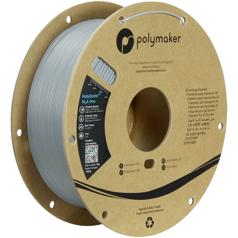 Une bobine grise de filament PLA de Polymaker, adaptée aux imprimantes 3D, conditionnée sur une bobine en carton écologique.