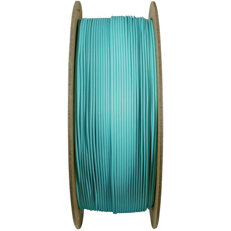 Une bobine de filament turquoise pour imprimante 3D ; une vue de dessus montrant des enroulements serrés et une forme de bobine standard.