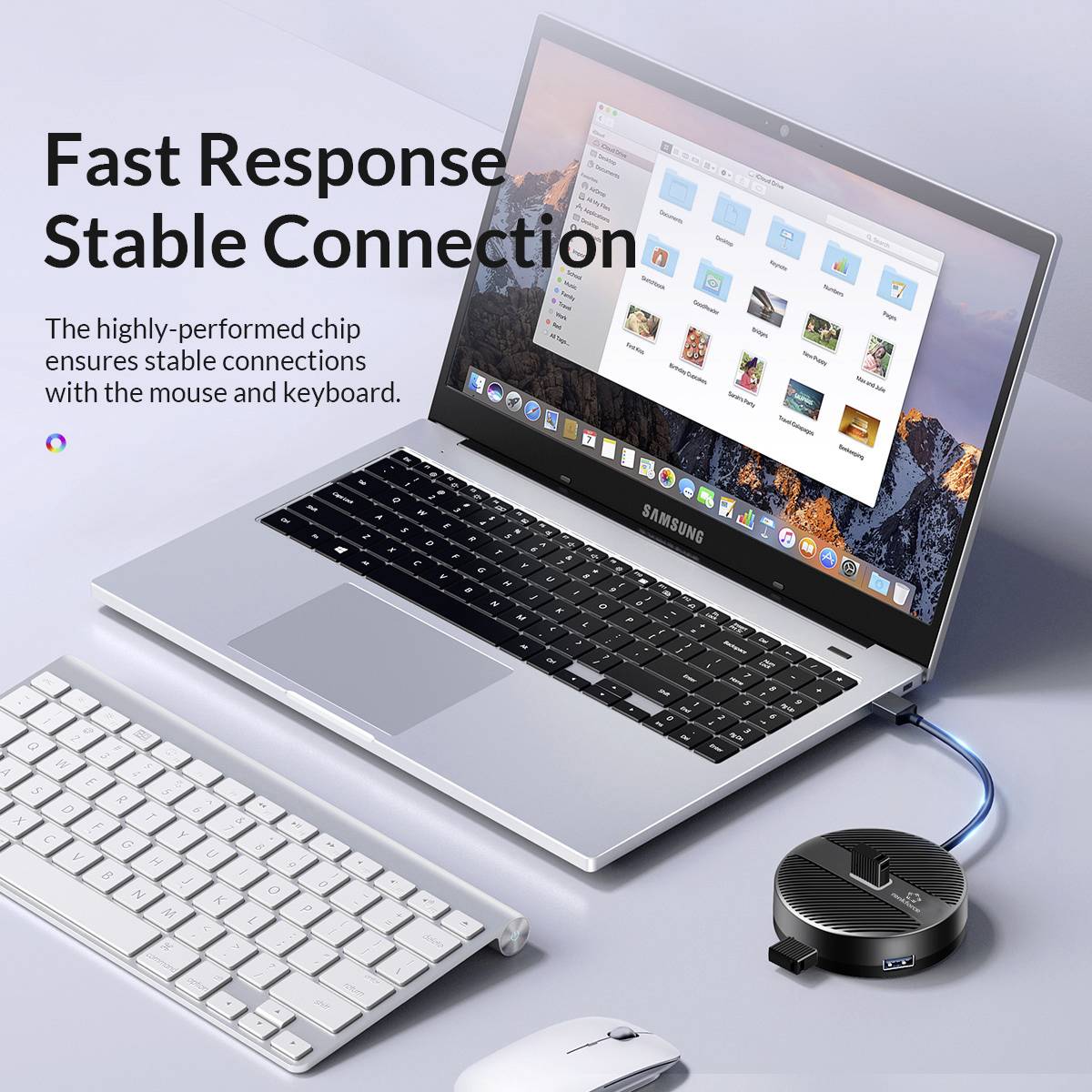 Un ordinateur portable, adaptateur connecté, clavier et souris sans fil. Texte : « Réponse rapide, Connexion stable » sur l'écran de l'ordinateur portable.