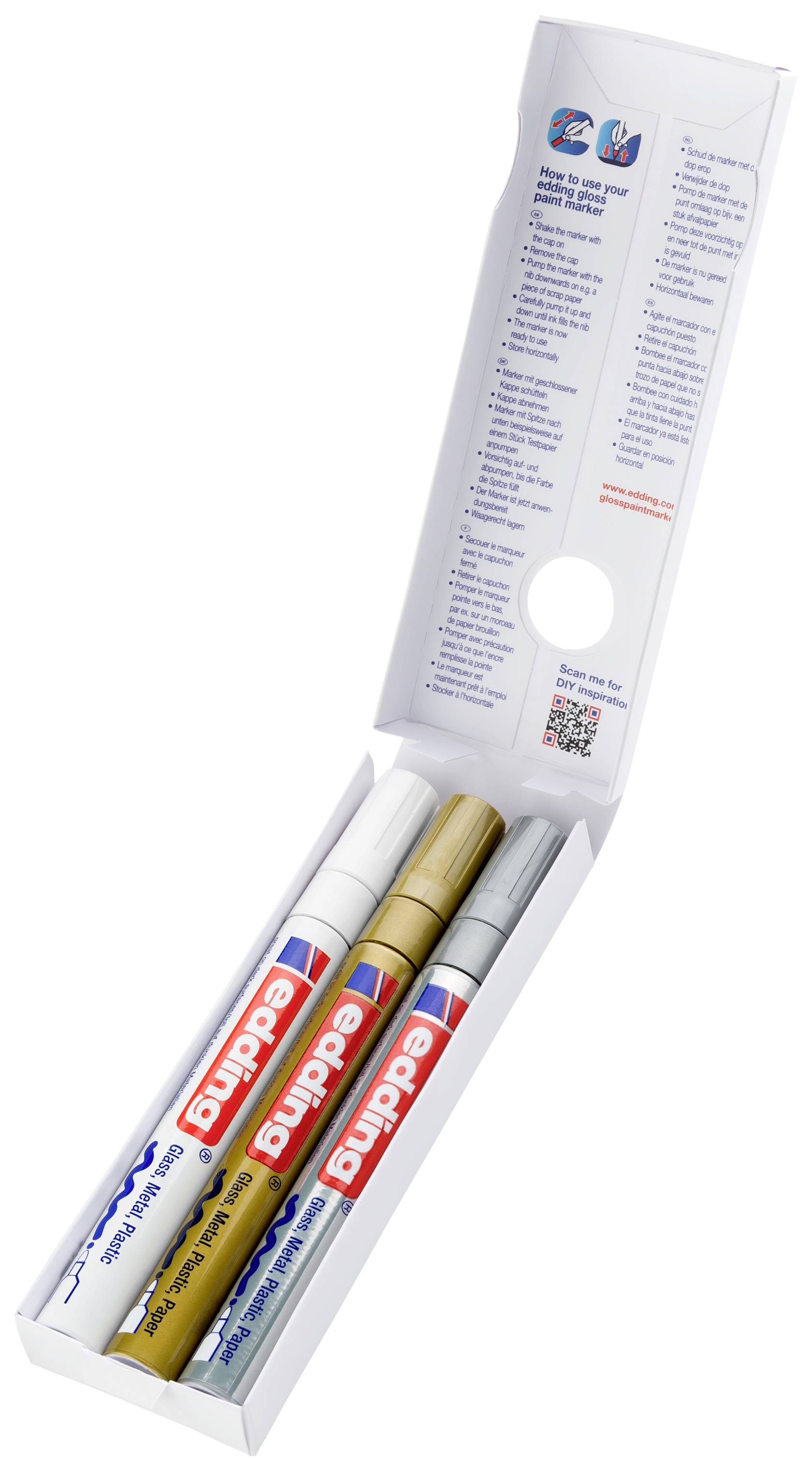 Un emballage ouvert contenant trois marqueurs de la marque Edding : blanc, or et argent. Les marqueurs sont disposés parallèlement les uns à côté des autres.