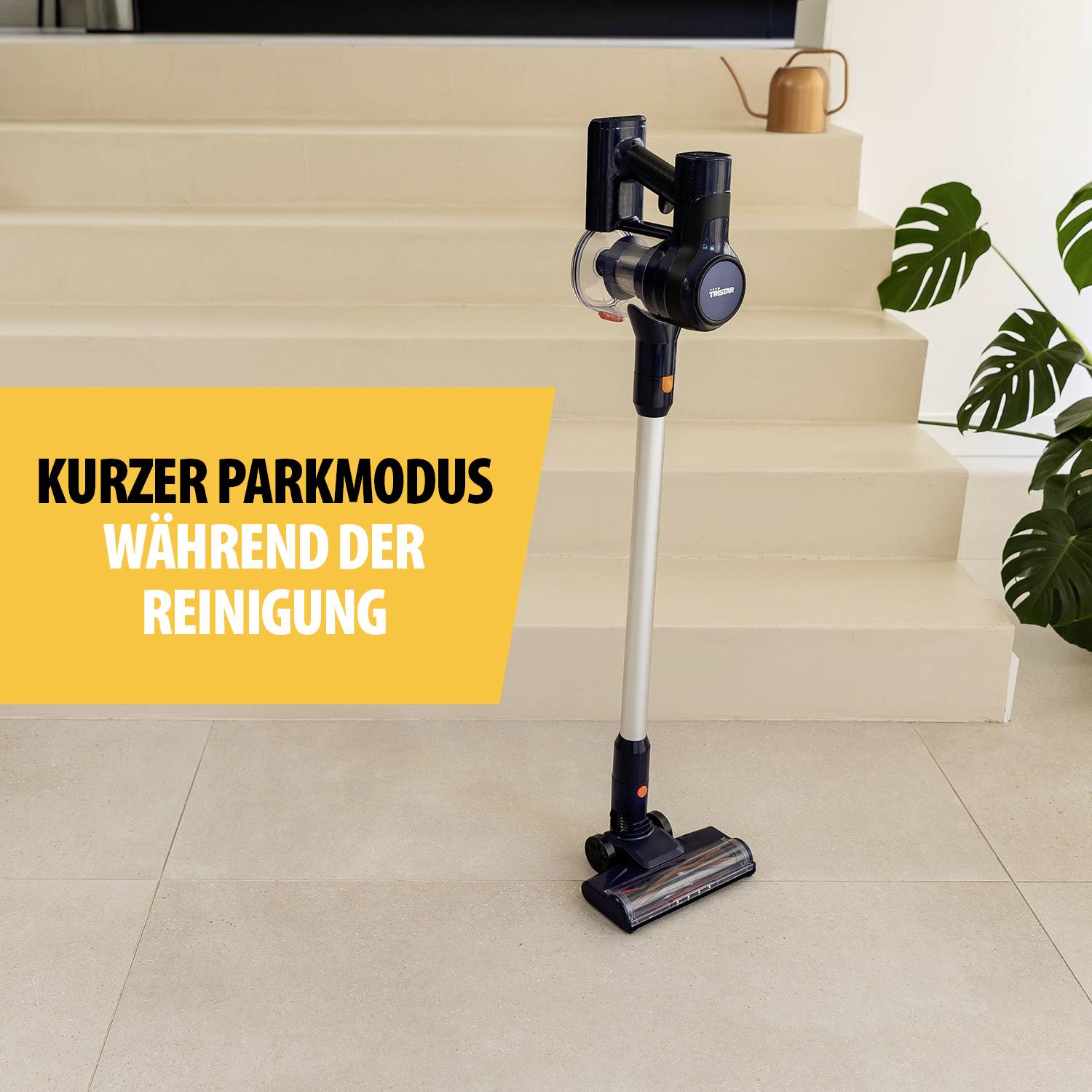 Aspirateur sans fil en mode parking devant un escalier. Texte sur un fond jaune : 