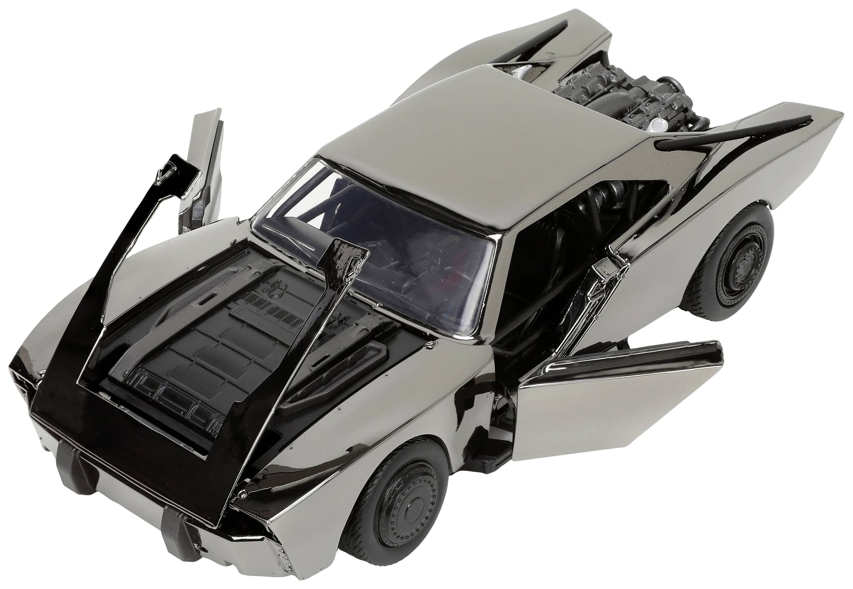 Une voiture miniature argentée avec des portes papillon ouvertes, vue de face. Elle présente un compartiment moteur détaillé et des pneus noirs.