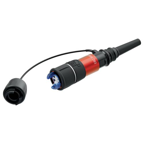 Un connecteur électrique cylindrique rouge avec un capuchon de protection noir. Adapté pour des applications industrielles.