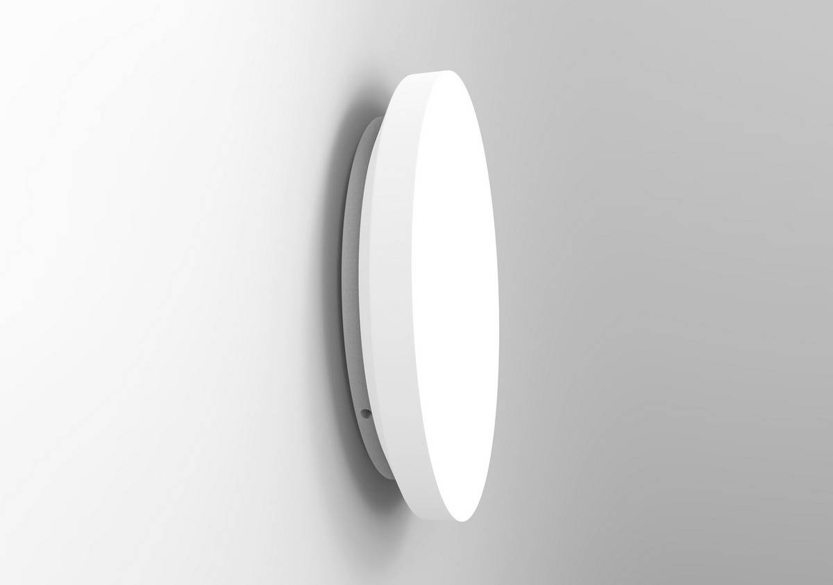 Un luminaire mural LED moderne, rond, avec un design épuré et blanc, installé sur un mur.