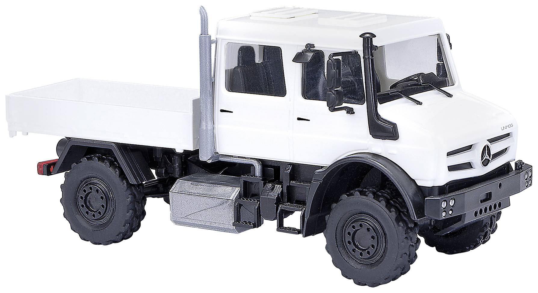 Une miniature blanche d'un camion au design robuste, avec des roues noires, photographiée de profil.