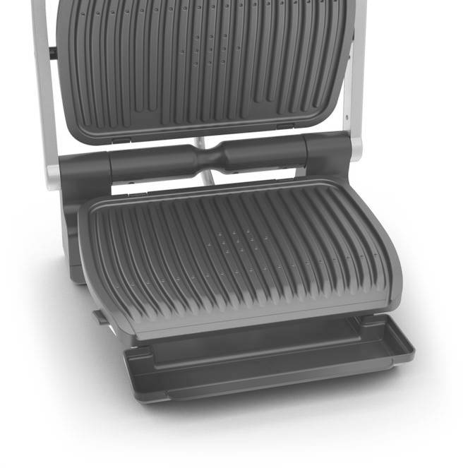 Grill de contact électrique à deux surfaces striées, adapté pour griller des sandwichs ou de la viande.