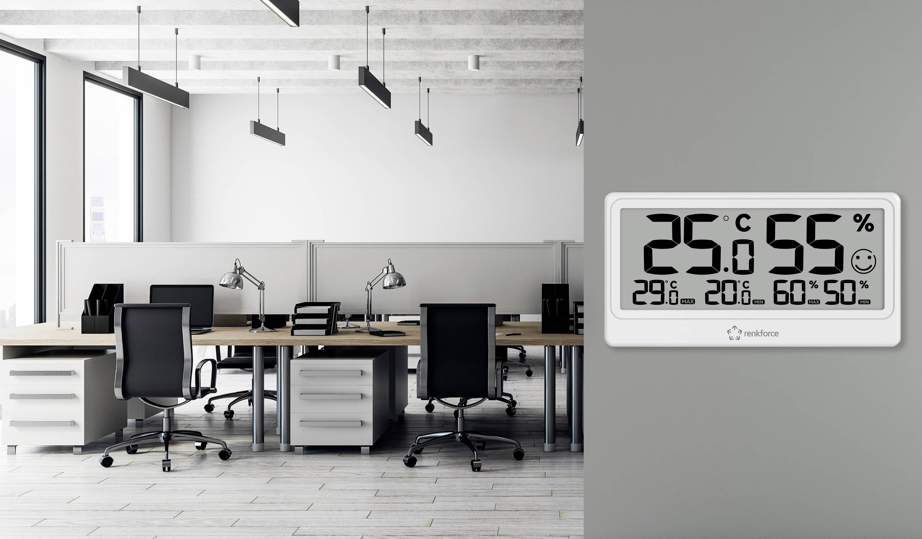 Bureau avec des bureaux et des chaises vides ; un thermomètre mural indique 25°C et 55% d'humidité, avec d'autres données climatiques.