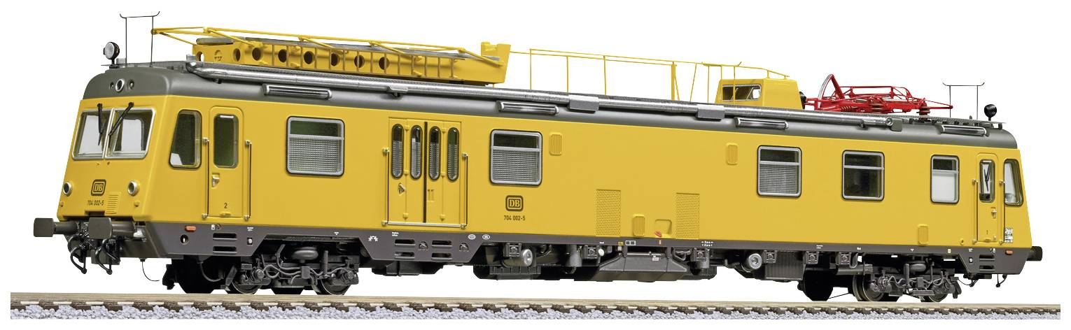 Autorail jaune avec dispositif de mesure des lignes aériennes, vue latérale. Le véhicule est équipé de diverses structures et dispositifs techniques.