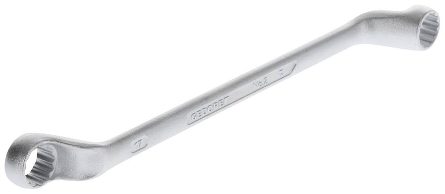 Clé à fourche en métal avec des extrémités de tailles différentes ; plus petite d'un côté et plus grande de l'autre. Outil utilisé pour manipuler des vis.